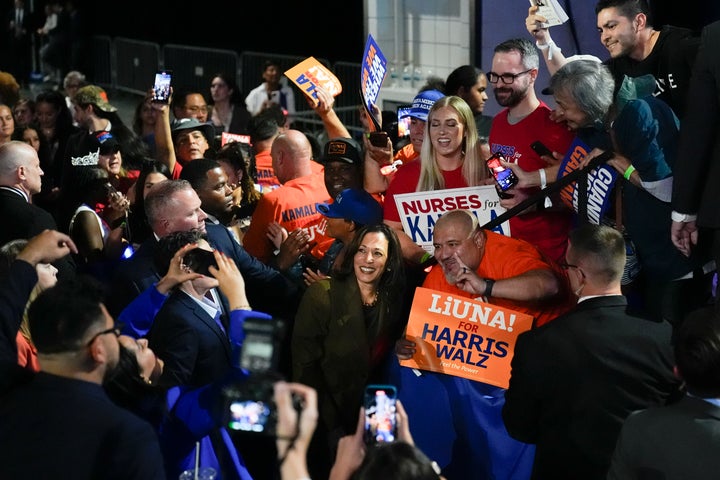 Harris poses for a photo with union members after her rally in Las Vegas on Sunday.