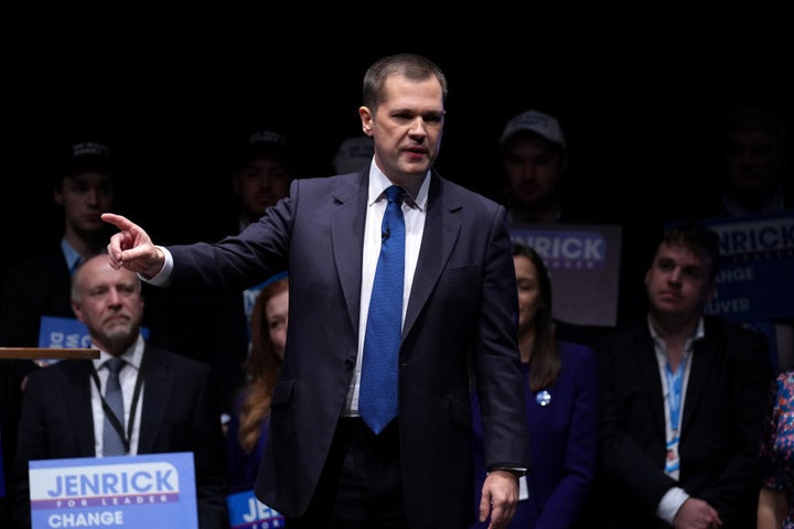 Robert Jenrick gestures as he speaks at a breakfast rally during the Conservative Party conference in Birmingham.