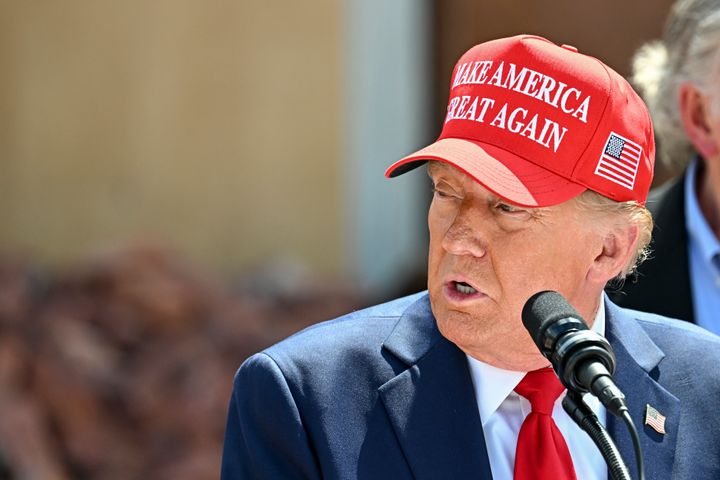 Former US President and Republican presidential candidate Donald Trump delivers remarks to the press in the aftermath of powerful storm Helene at Chez What furniture store in Valdosta, Georgia, September 30, 2024.