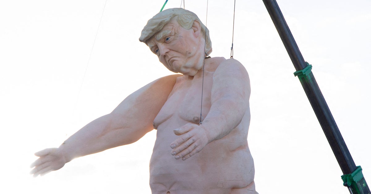 NextImg:Giant Naked Trump Statue Shows Him In A Swing State