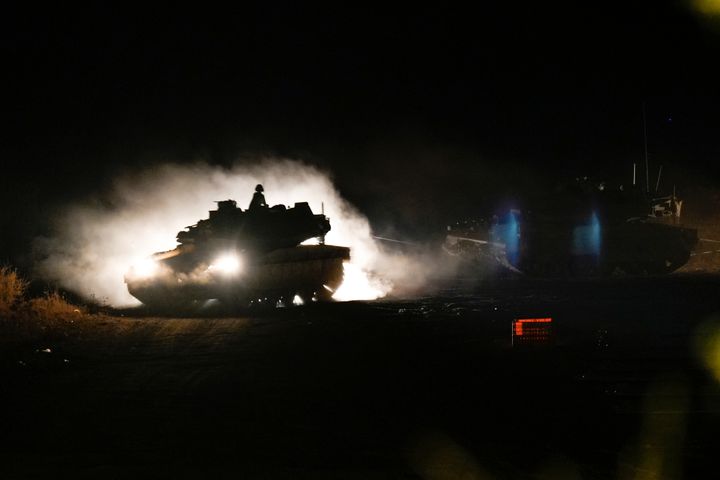 An Israeli tank maneuvers in northern Israel near the Israel-Lebanon border, Monday, Sept. 30, 2024. (AP Photo/Baz Ratner)