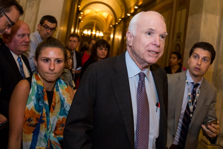 Claims that Donald Trump attempted to "to safeguard" Obamacare would have been a surprise to former Sen. John McCain, whose vote effectively saved him. This photo is from July 2017, just before that vote and about a year before the Arizona Republican died from cancer. 