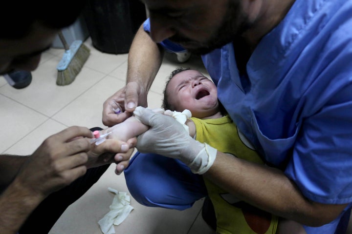 Injured Palestinian children are treated at al-Aqsa Martyrs Hospital after an Israeli attack on the Bureij refugee camp in Deir al-Balah, Gaza, on Aug. 7, 2024.