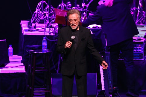 Frankie Valli performs with his quartet, The Four Seasons, in Niagara Falls, Canada, this past June. The crooner assured fans no one was "forcing" him to take the stage after video of some recent concerts prompted fans to be concerned.