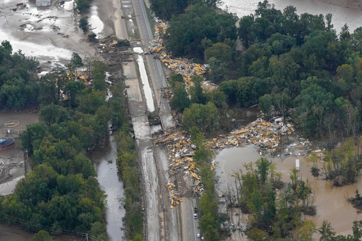 Roads are seen damaged and covered with debris on Sept. 28 after Hurricane Helene swept through the area. The raging waters swept 11 people from a nearby plastics factory, and only five were rescued.