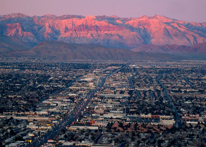 This Feb. 9, 2005, file photo shows the suburbs of Las Vegas from atop the Stratosphere tower looking west down Sahara Ave., toward the Spring Mountains. Despite drought, cities in the U.S. West expect their populations to grow considerably in the coming decades.