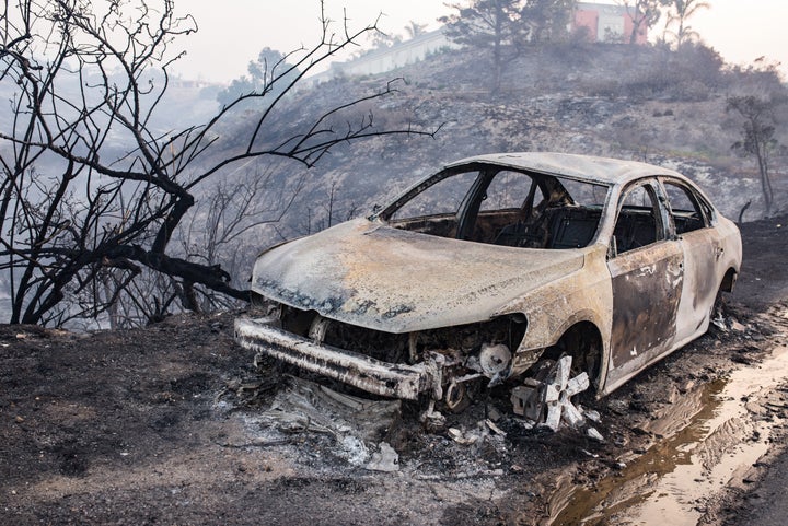 Gen Z Talks About This Kind Of Anxiety More Than Anyone Else — But We're All Starting To Feel It 4 Remains of a burnt car on the side of Pacific Coast Highway after the Woolsey Fire swept through in 2018. Some wealthy Angelenos hired private firefighters to protect their mansions from burning.