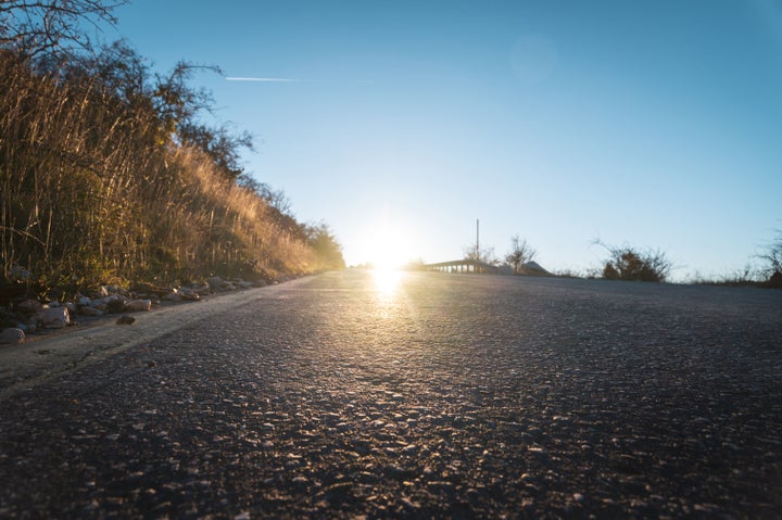 This is a photo of the bright sunlight on an asphalt road