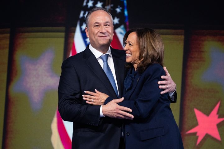 Doug Emhoff, who's been accused of assaulting an ex-girlfriend, is pictured with his wife, presidential nominee Kamala Harris, at the Democratic National Convention. 