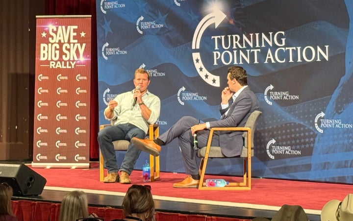 Montana GOP Senate candidate Tim Sheehy speaks with conservative commentator Charlie Kirk at an event in Missoula, Montana. 