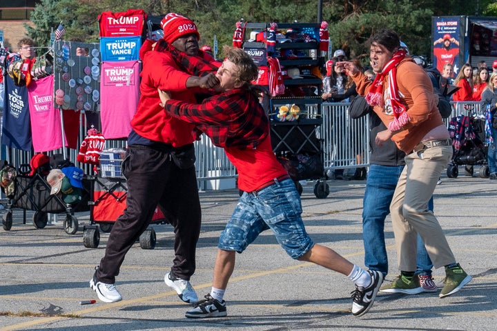 The souvenir sellers scuffled on campus before Donald Trump's arrival.