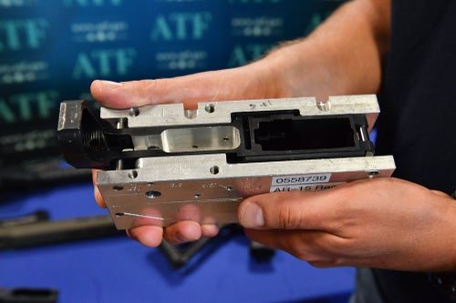 A jig and receiver for a rifle "ghost gun" seized by federal law enforcement is displayed on April 18, 2022, at the Bureau of Alcohol, Tobacco, Firearms and Explosives (ATF) field office in Glendale, California.