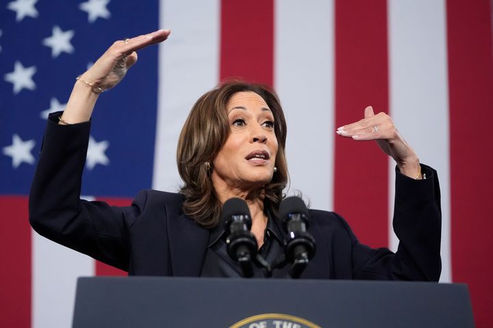 Democratic presidential nominee Kamala Harris speaks during an event Friday at a fire station in Redford Township, Michigan. She emphasized manufacturing job growth under the Bush administration.