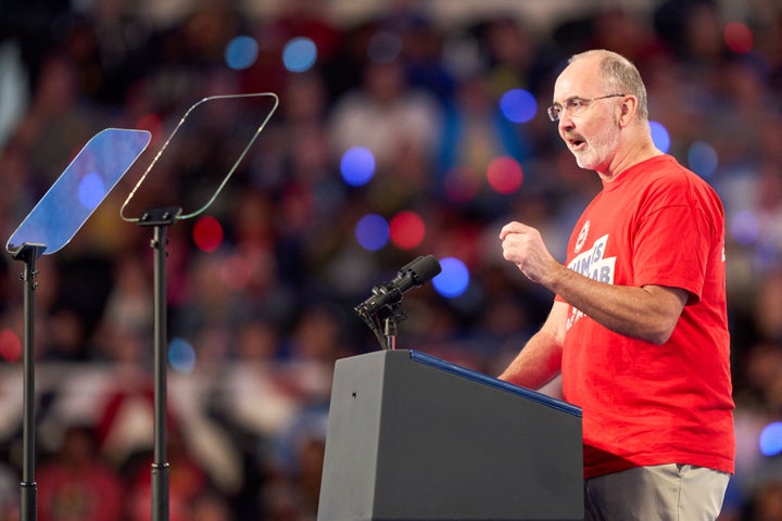 United Auto Workers President Shawn Fain speaks Friday to the crowd at a campaign rally for Vice President Kamala Harris, the Democratic presidential nominee, in Flint, Michigan.