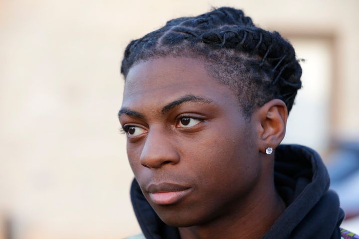 FILE - Darryl George, a 17-year-old junior, before walking across the street to go into Barbers Hill High School after serving a 5-day in-school suspension for not cutting his hair Monday, Sept. 18, 2023, in Mont Belvieu. (AP Photo/Michael Wyke, File)