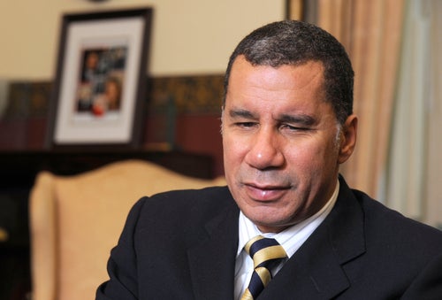 Former New York Gov. David Paterson, seen in 2010, said he was walking his dog Saturday night when he and his stepson were assaulted. 
