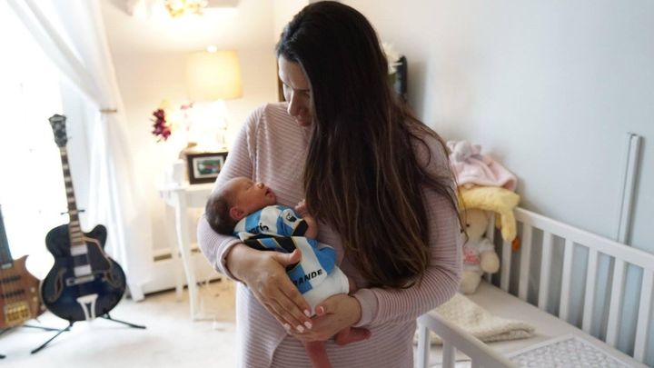 The author and her daughter Bella as a newborn in March 2016.