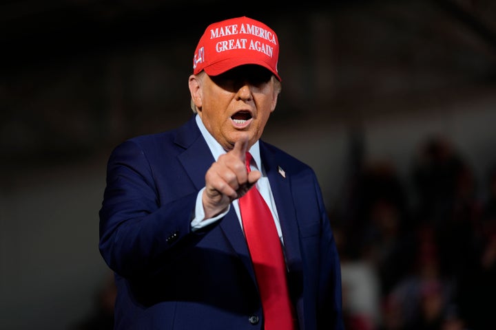 Republican presidential nominee former President Donald Trump arrives to speak during a campaign rally at Dodge County Airport, Sunday, Oct. 6, 2024, in Juneau, Wis. (AP Photo/Julia Demaree Nikhinson)