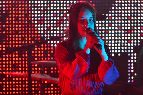 Singer Nell Smith performs with The Flaming Lips in England in May 2022. The teenage musician died in a car accident over the weekend.