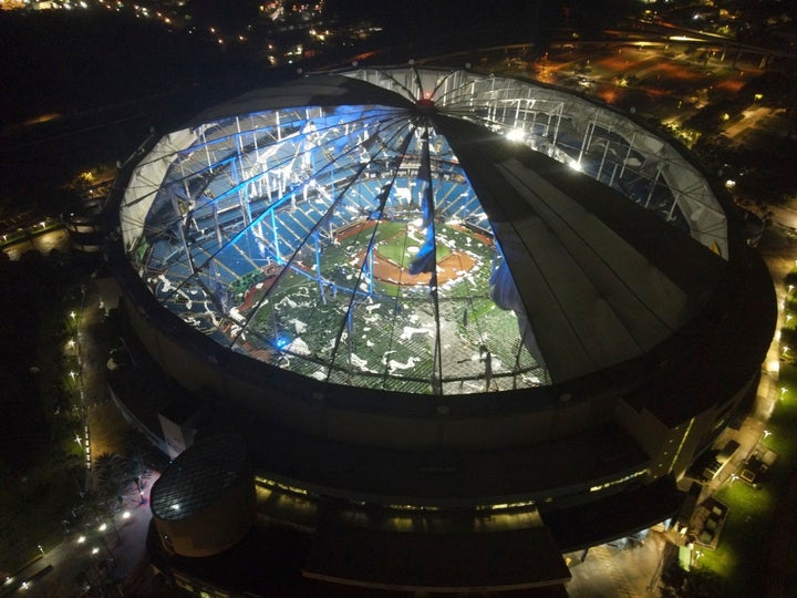 An aerial view of Tropicana Field's shredded roof in downtown St. Petersburg, Florida, in the wake of Hurricane Milton early Thursday.