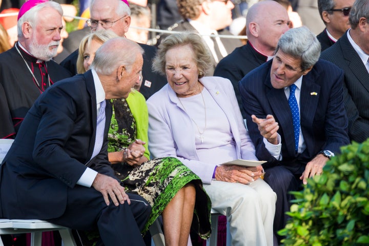 Secretary of State John Kerry talks with Vice President Joe Biden during an arrival ceremony on the South Lawn of the White House in Washington, D.C. In the middle is Ethel Kennedy. (Photo by Brooks Kraft LLC/Corbis via Getty Images)