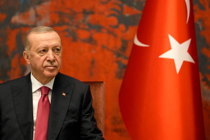 Turkey's President Recep Tayyip Erdogan listens his Serbian counterpart Aleksandar Vucic during their meeting in Belgrade, Serbia, Friday, Oct. 11, 2024. (AP Photo/Darko Vojinovic)