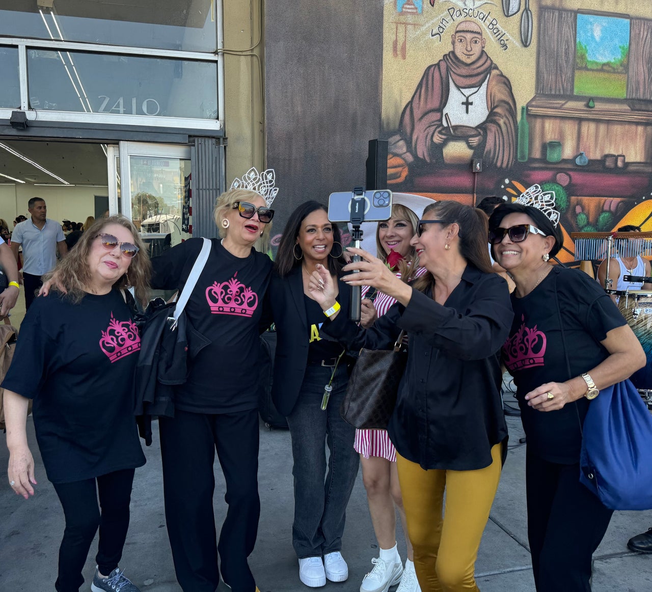 Maya Harris, the vice president's younger sister (standing third from left), poses with a group of Latina small-business owners outside a Latino cultural event in Las Vegas on Sept. 28.