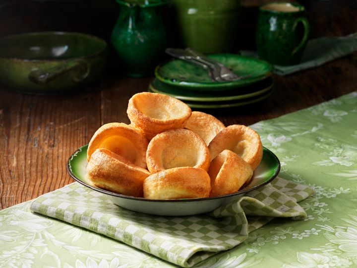 Bowl of yorkshire pudding with green colour pottery