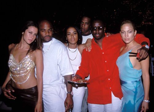 Left to right: Natane Adcock, Damon Dash, Aaliyah, Jay Z, Sean Combs and Jennifer Lopez at Combs' Fourth of July party on July 2, 2000, in East Hampton.