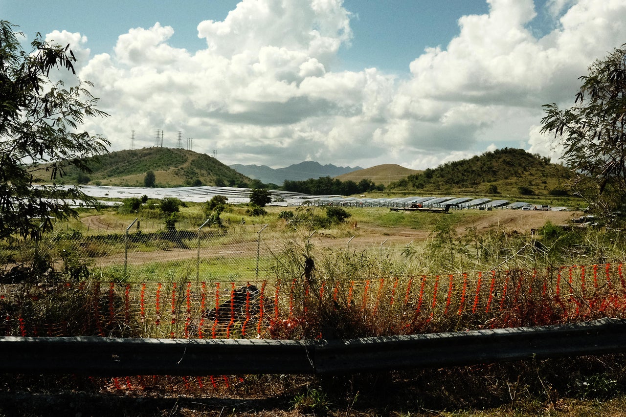 The Ciro One solar farm, Puerto Rico's largest such facility, is seen under construction in Salinas. Neighbors in the next-door town blame the solar plant for creating flooding problems.