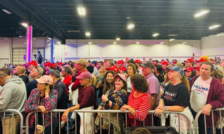 Trump supporters wait to hear the former president speak at a rally in Oaks, Pennsylvania. 