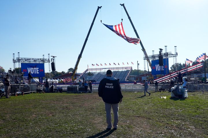 A U.S. Secret Service agent looks over the site before former President Donald Trump speaks at a presidential campaign rally on Oct. 5 in Butler, Pennsylvania, the same site where a gunman tried to assassinate him in July.