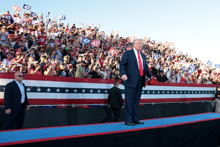 Donald Trump greets his supporters during a rally at Calhoun Ranch in Coachella Saturday.