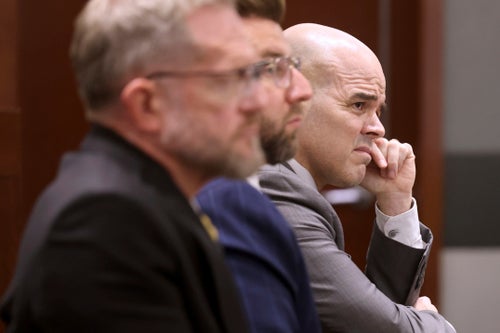 Robert Telles, right, a former Clark County public administrator, listens to closing arguments during his murder trial at the Regional Justice Center in Las Vegas, Aug. 26, 2024. 