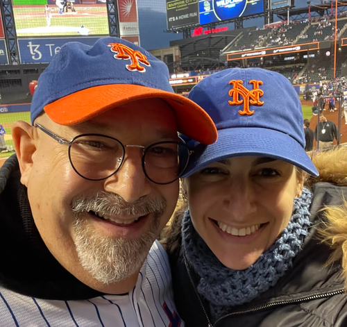 The author and her dad in his season’s ticket-holder seats at a game in Oct 2022.