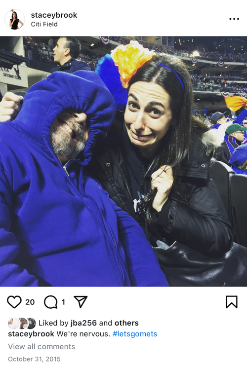 The author and her dad in a "perpetual state of worry" while watching the Mets (lose) in the 2015 World Series.