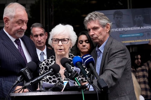 Kitty Menendez' sister, Joan Andersen VanderMolen, center, walks up to podium to make a statement during a press conference to announce developments in the case of brothers Erik and Lyle Menendez, Oct. 16, 2024, in Los Angeles.