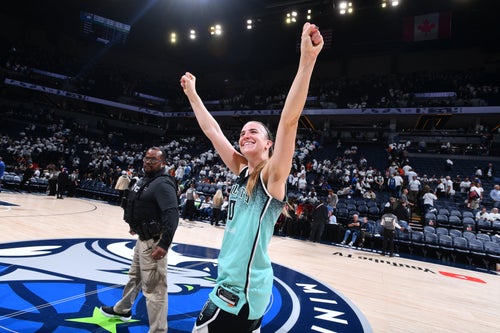 MINNEAPOLIS, MN - OCTOBER 16: Sabrina Ionescu #20 of the New York Liberty celebrates after defeating the Minnesota Lynx during Game Three of the 2024 WNBA Finals on October 16, 2024 at Target Center in Minneapolis, Minnesota. NOTE TO USER: User expressly acknowledges and agrees that, by downloading and or using this Photograph, user is consenting to the terms and conditions of the Getty Images License Agreement. Mandatory Copyright Notice: Copyright 2024 NBAE (Photo by Barry Gossage/NBAE via Getty Images)