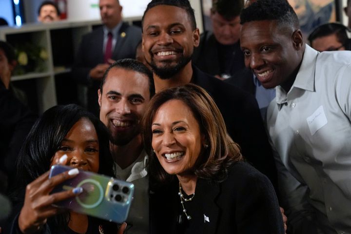 Democratic presidential nominee Vice President Kamala Harris poses for a photo as she visits Norwest Gallery of Art in Detroit, on Oct. 15, 2024.