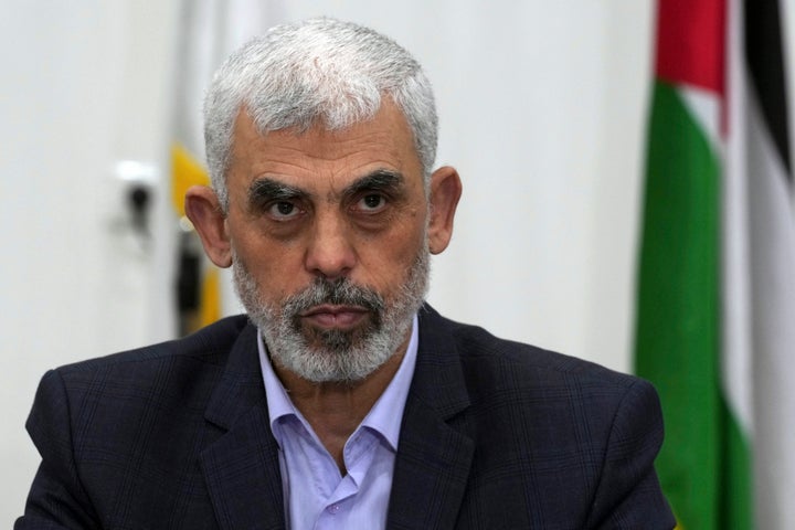 Yahya Sinwar, head of Hamas in Gaza, chairs a meeting with leaders of Palestinian factions at his office in Gaza City, on April 13, 2022. (AP Photo/Adel Hana)