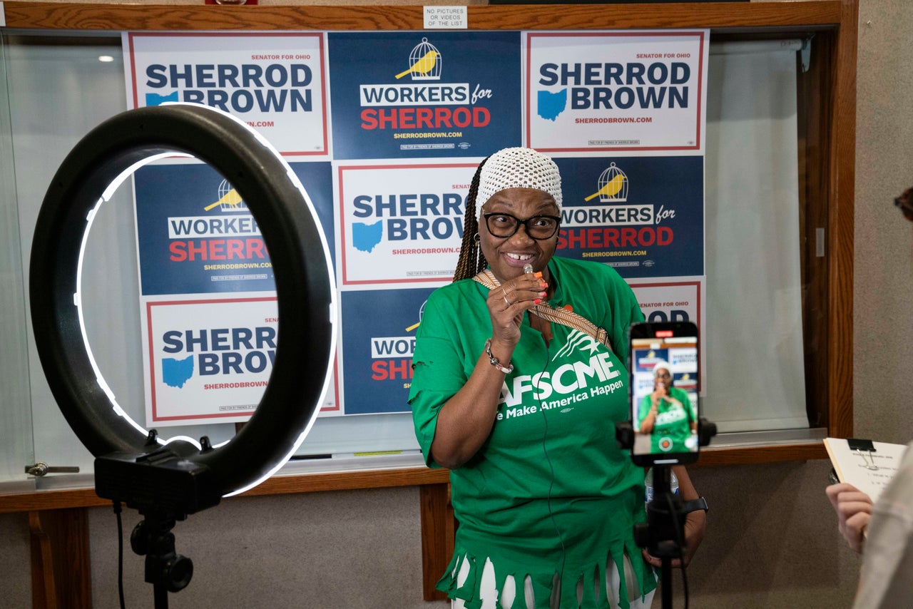 Desiree Spears of Toledo films a video in support of Sen. Sherrod Brown at a rally at the UA Local 50 in Northwood, Ohio.