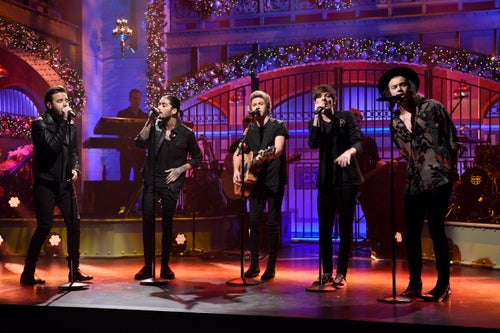 One Directions's Liam Payne, Zayn Malik, Niall Horan, Louis Tomlinson and Harry Styles (left to right) perform during a 2014 episode of "Saturday Night Live." The group mourned Payne's death in a joint statement on Thursday.