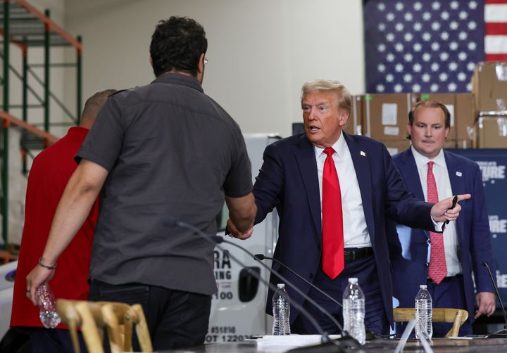 Donald Trump talks to voters after a Latino roundtable on Oct. 12 in North Las Vegas, Nevada. Nevada Latino voters are heavily represented in fields where tips are common.