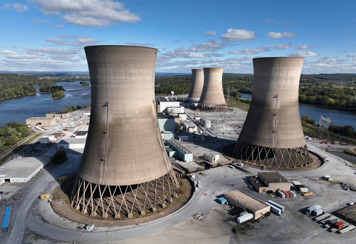 In this aerial view, the shuttered Three Mile Island nuclear power plant stands in the middle of the Susquehanna River on Oct. 10, 2024, near Middletown, Pennsylvania. The plant’s owner, Constellation Energy, plans to spend $1.6 billion to refurbish the reactor that it closed five years ago and restart it by 2028 after Microsoft recently agreed to buy as much electricity as the plant can produce for the next 20 years to power its growing fleet of data centers.