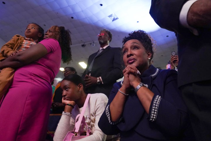 Harris Rallies Georgia's Black Churchgoers With Assist Of Stevie Surprise 1 Harris supporters listen as she speaks at Divine Faith Ministries International in Jonesboro, Georgia, on October 20, 2024.
