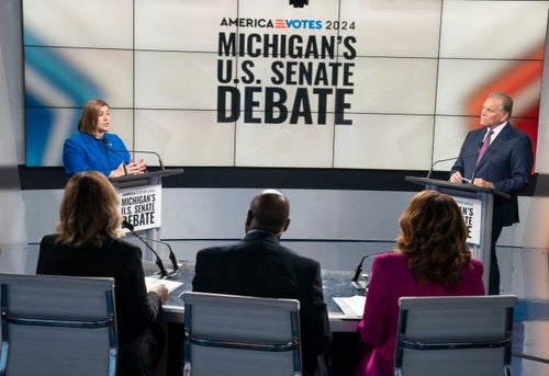Rep. Elissa Slotkin (D) and Rep. Mike Rogers (R) debate for the open Michigan U.S. Senate seat on Oct. 14, 2024.