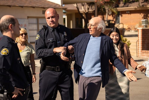 Larry David gets arrested for handing a water bottle to a woman waiting to vote in an episode of "Curb Your Enthusiasm."