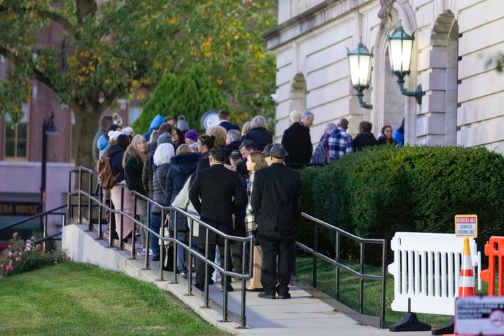 Spectators line up to enter the Carroll County Courthouse on Oct. 18 for the trial of Richard Allen, charged in the 2017 murders of the two teenage girls.