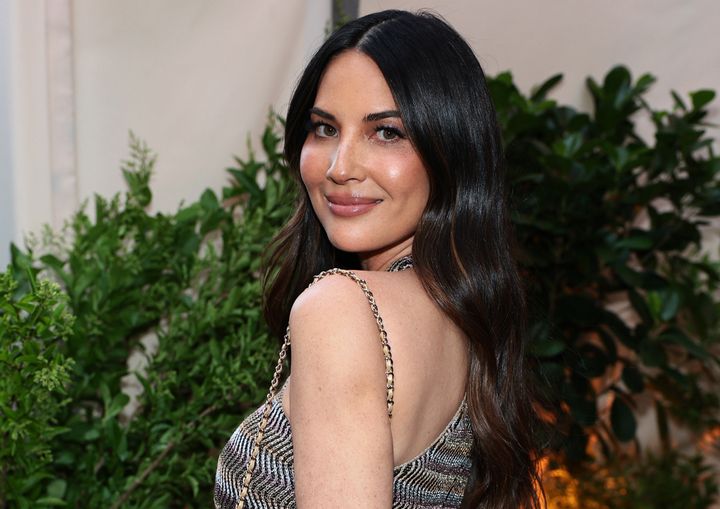 Olivia Munn attends Chanel's Tribeca Festival Artists Dinner on June 10. On Tuesday, the star talked about embracing her mastectomy scars in a new campaign for the shapewear brand Skims.