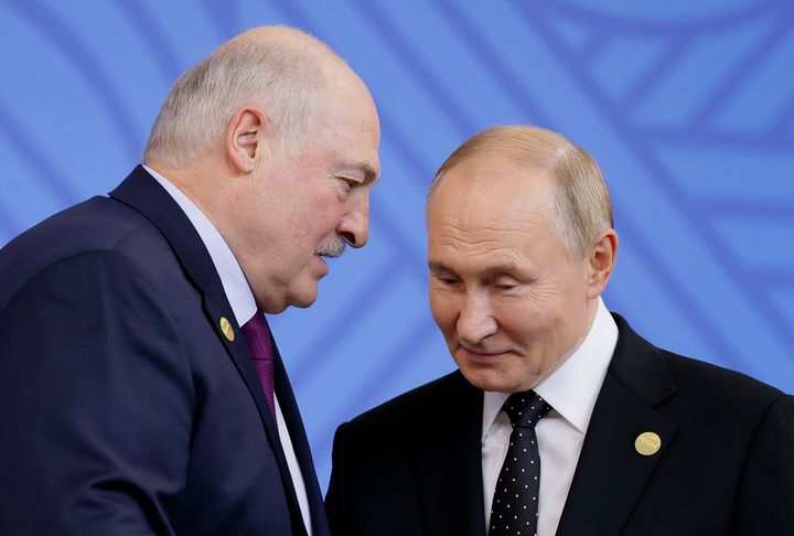 Russian President Vladimir Putin, right, greets Belarusian President Alexander Lukashenko during an official welcoming ceremony for delegations' heads at the BRICS summit in Kazan, Russia, Wednesday, Oct. 23, 2024.